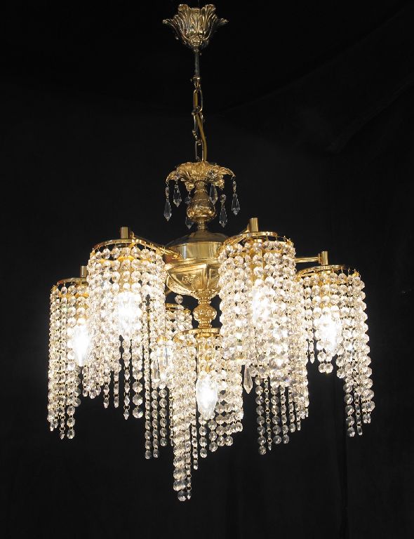 Gold brass chandelier with crystal chain shades